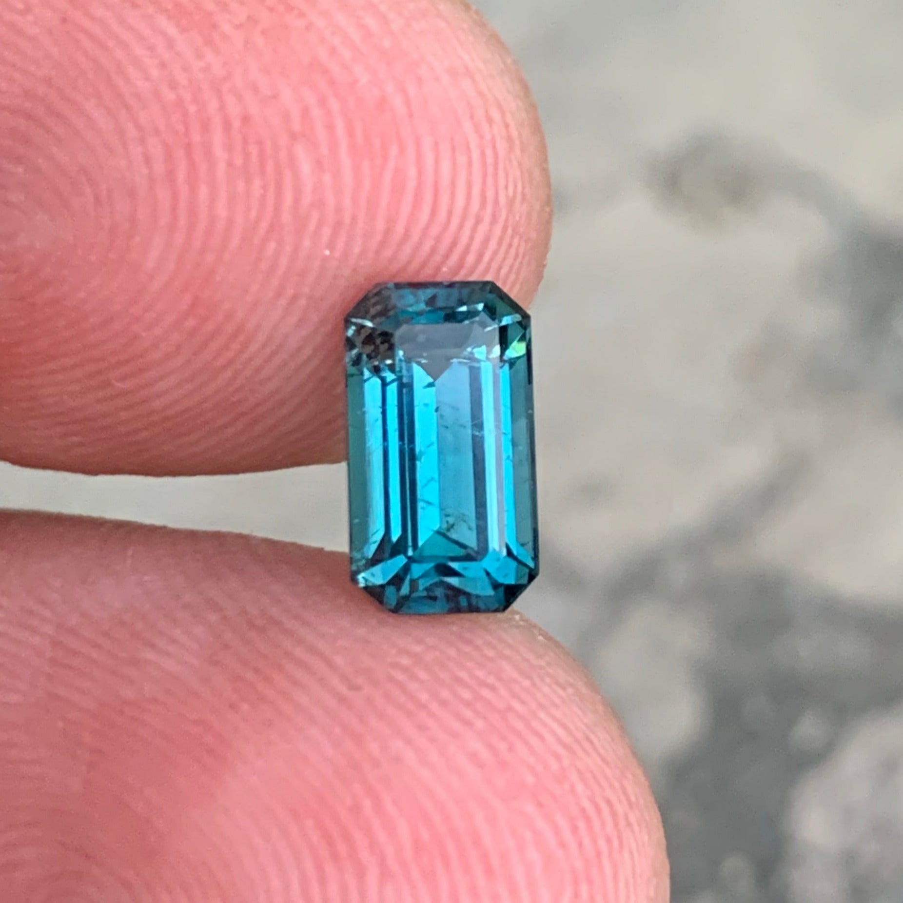 emerald cut neon blue tourmaline loose gemstone
