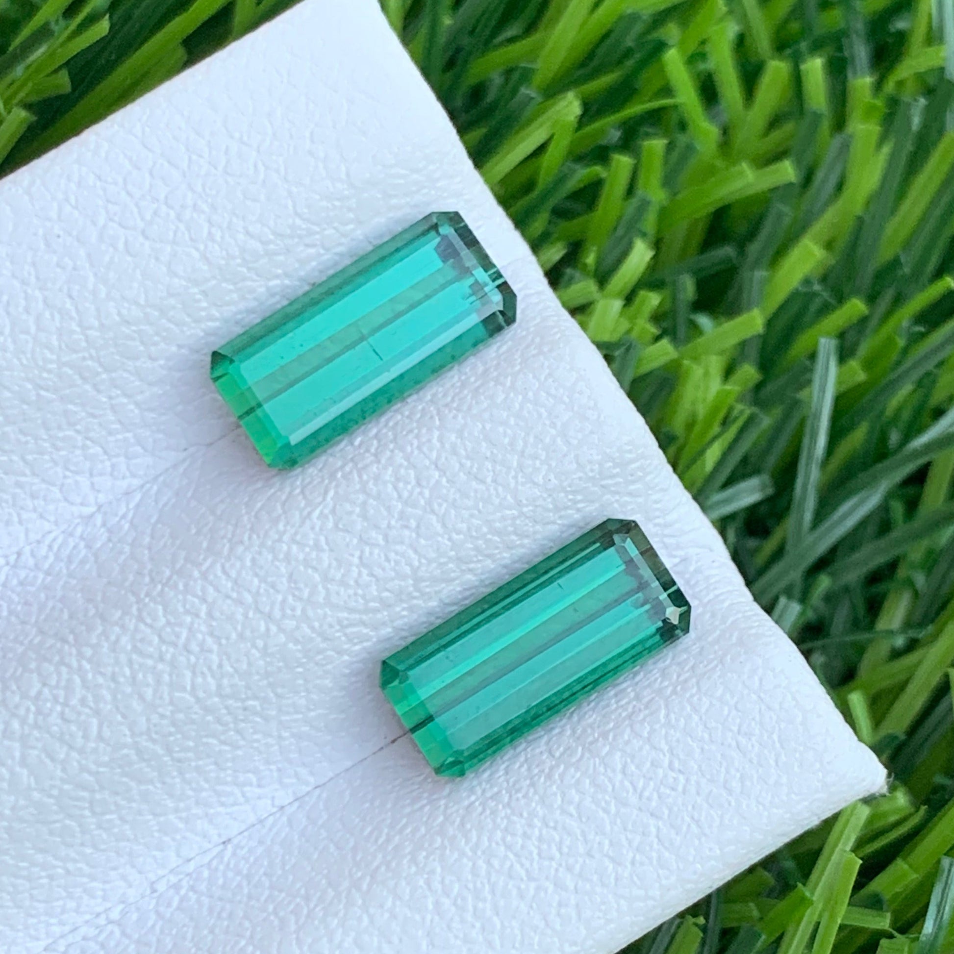 Loose Green Tourmaline Pair
untreated tourmaline gemstones

green tourmaline pair from Afghanistan

tourmaline gemstone earrings pair