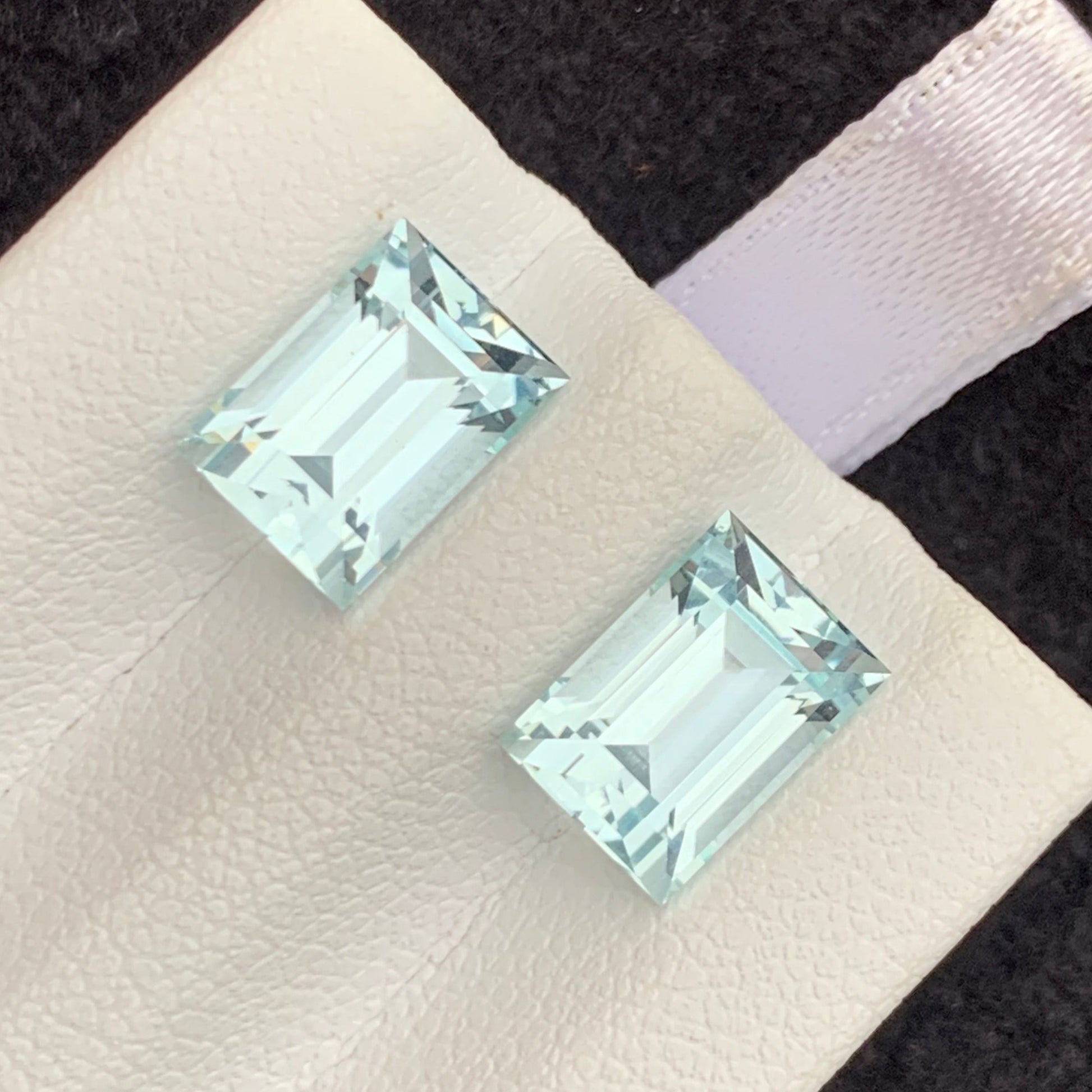 fine quality aquamarine gemstones for luxury earring design
natural aquamarine pair side by side baguette cut precision shape