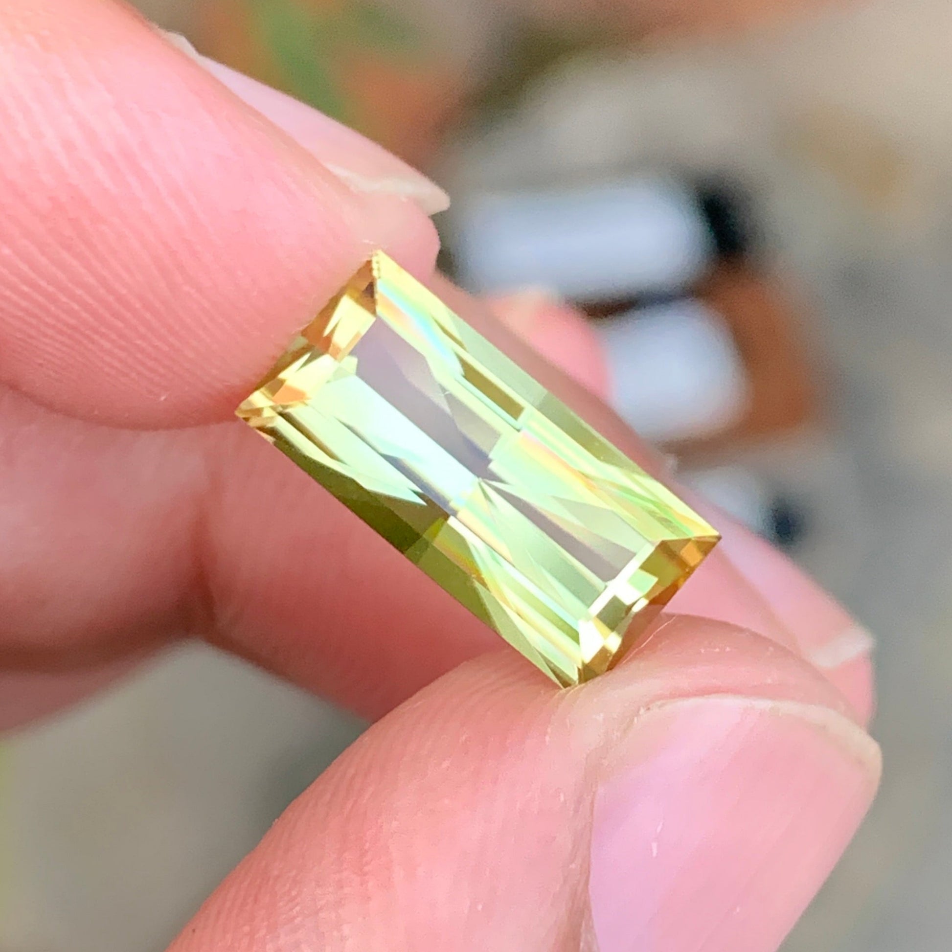 Greenish Yellow Tourmaline
Tourmaline gemstone
greenish yellow tourmaline 4.18 carats baguette cut
natural green yellow tourmaline gemstone Afghanistan
