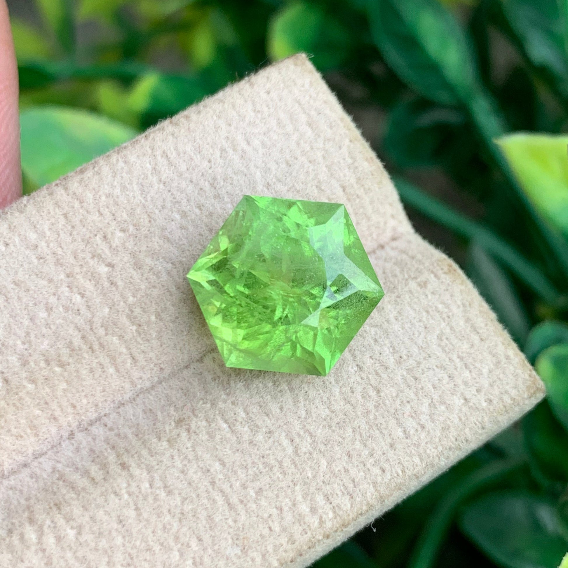 hexagonal cut peridot gemstone close up macro