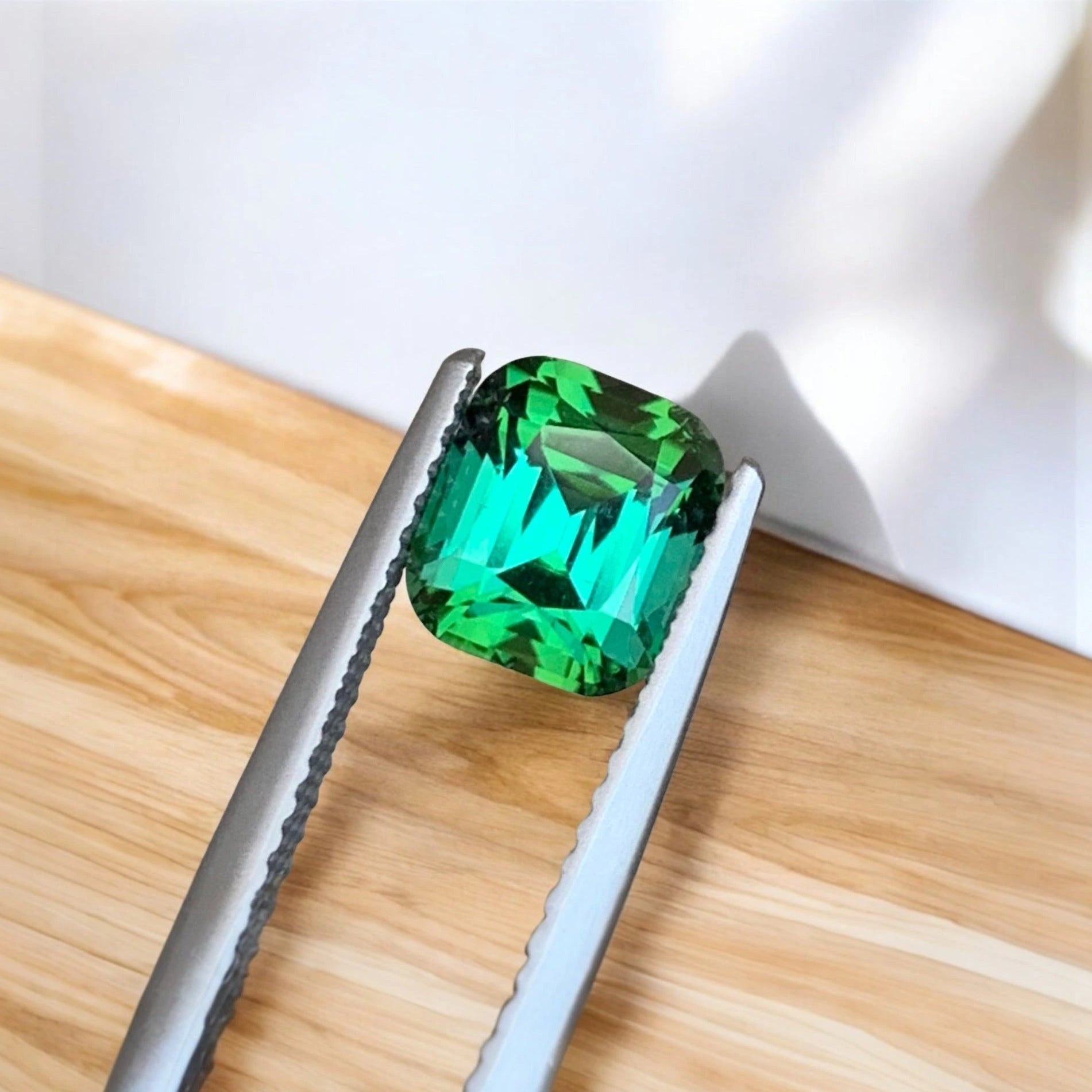 is green tourmaline rare
bluish green emerald price
