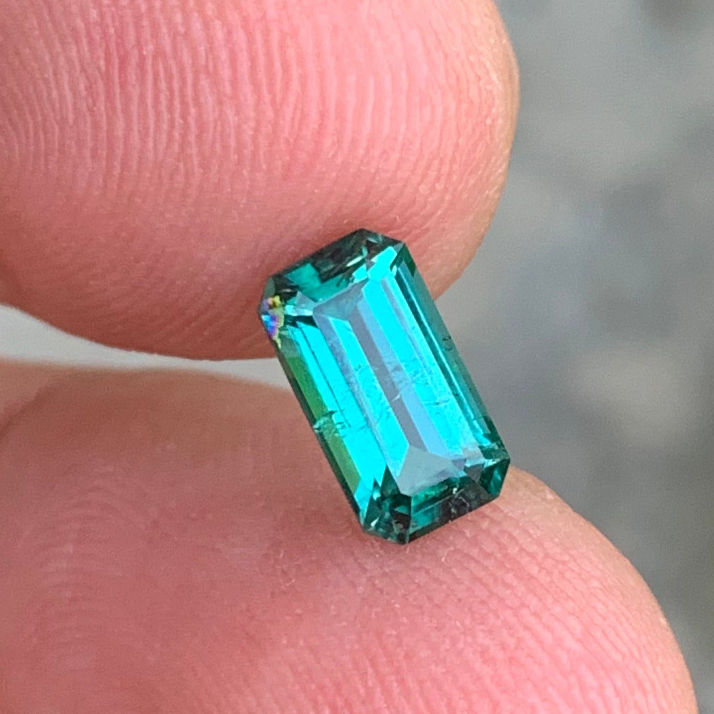 Lagoon Tourmaline ring
emerald cut tourmaline gemstone vvs clarity
bluish green lagoon tourmaline for jewelry