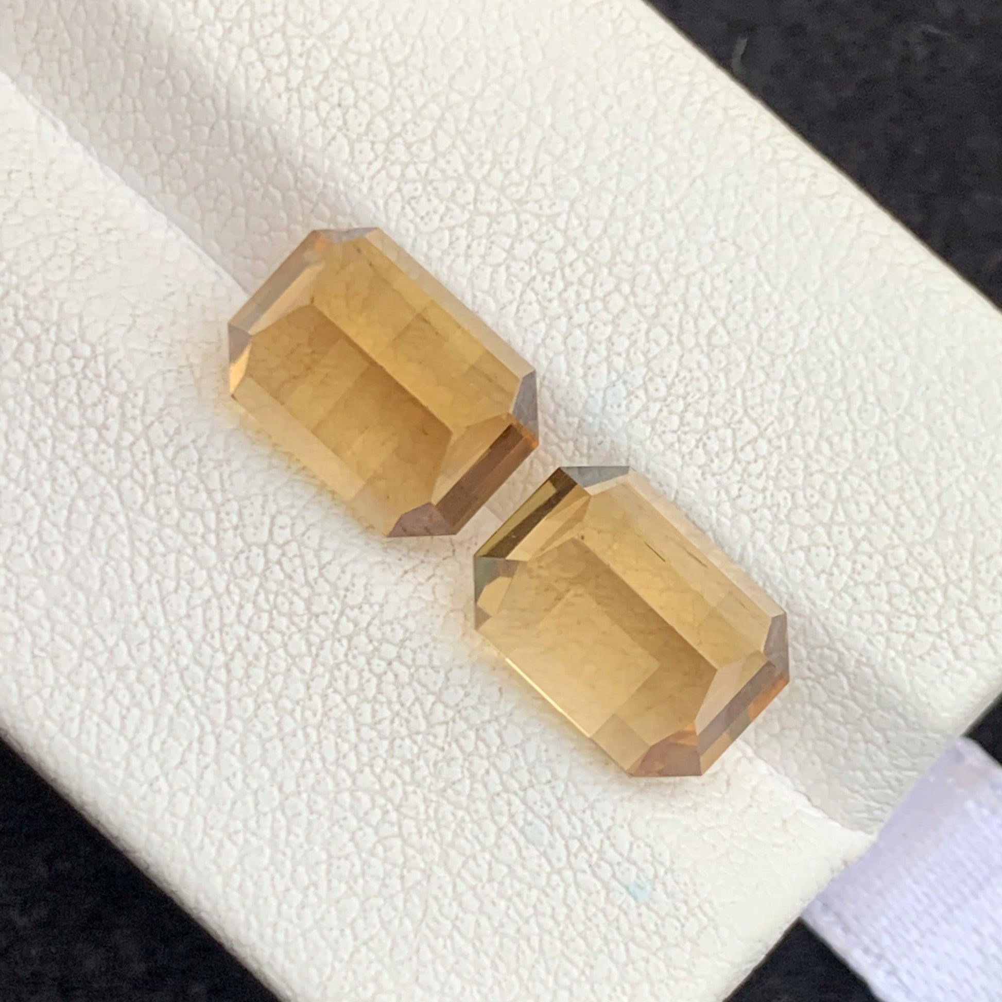 luxury citrine gemstone pair rare pixel faceting sparkle effect
yellow citrine loose gemstones macro detail high clarity Brazil origin
matched citrine pair for rings and pendants designer jewelry stones