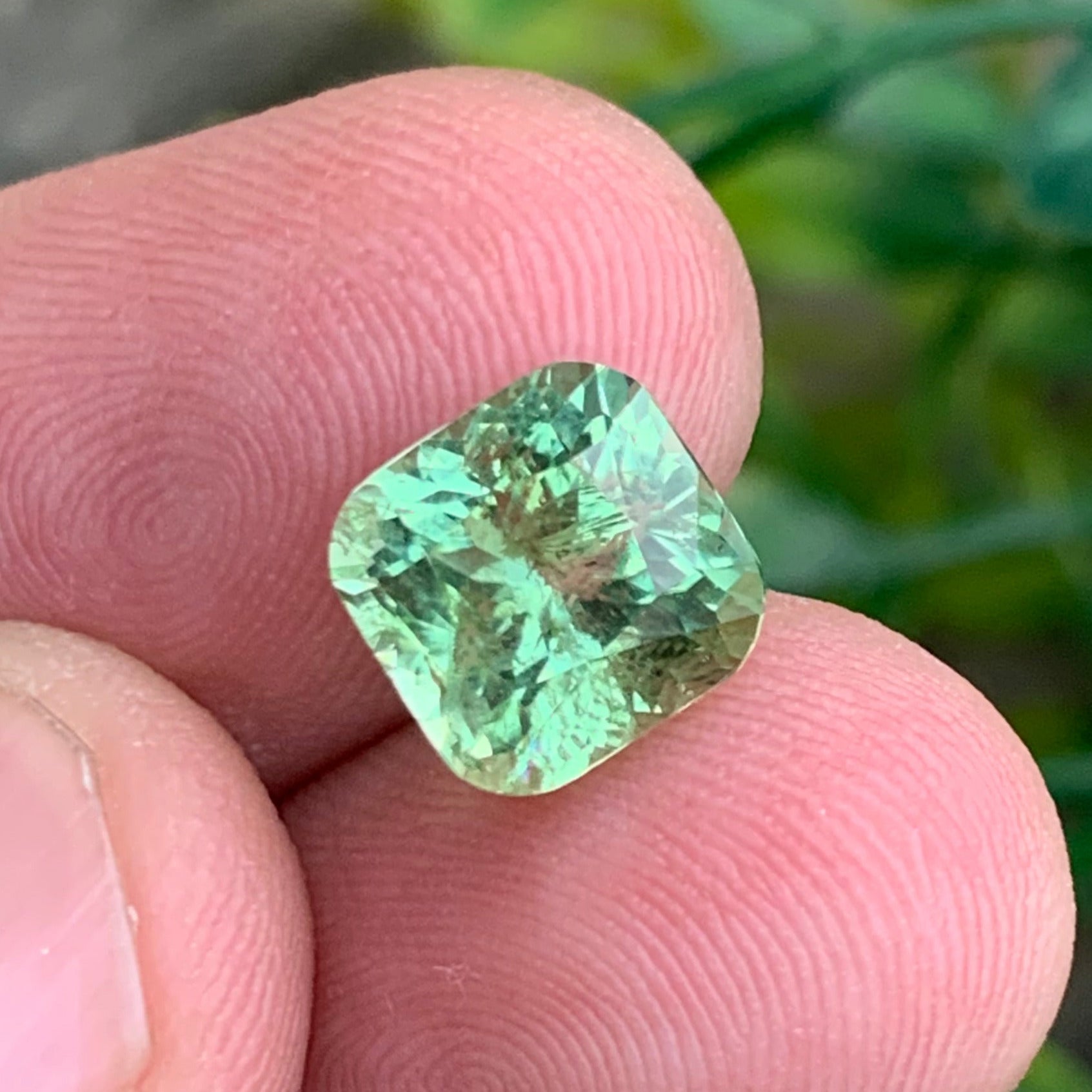 Apple Green Tourmaline ring
mint green tourmaline afghanistan natural
cushion cut green tourmaline 4.35 carats