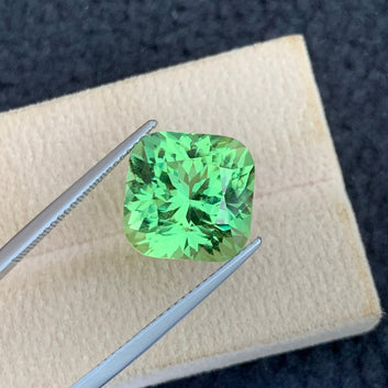 natural Pakistani peridot gemstone 10.60 carats close view
cushion cut apple green peridot loose gemstone