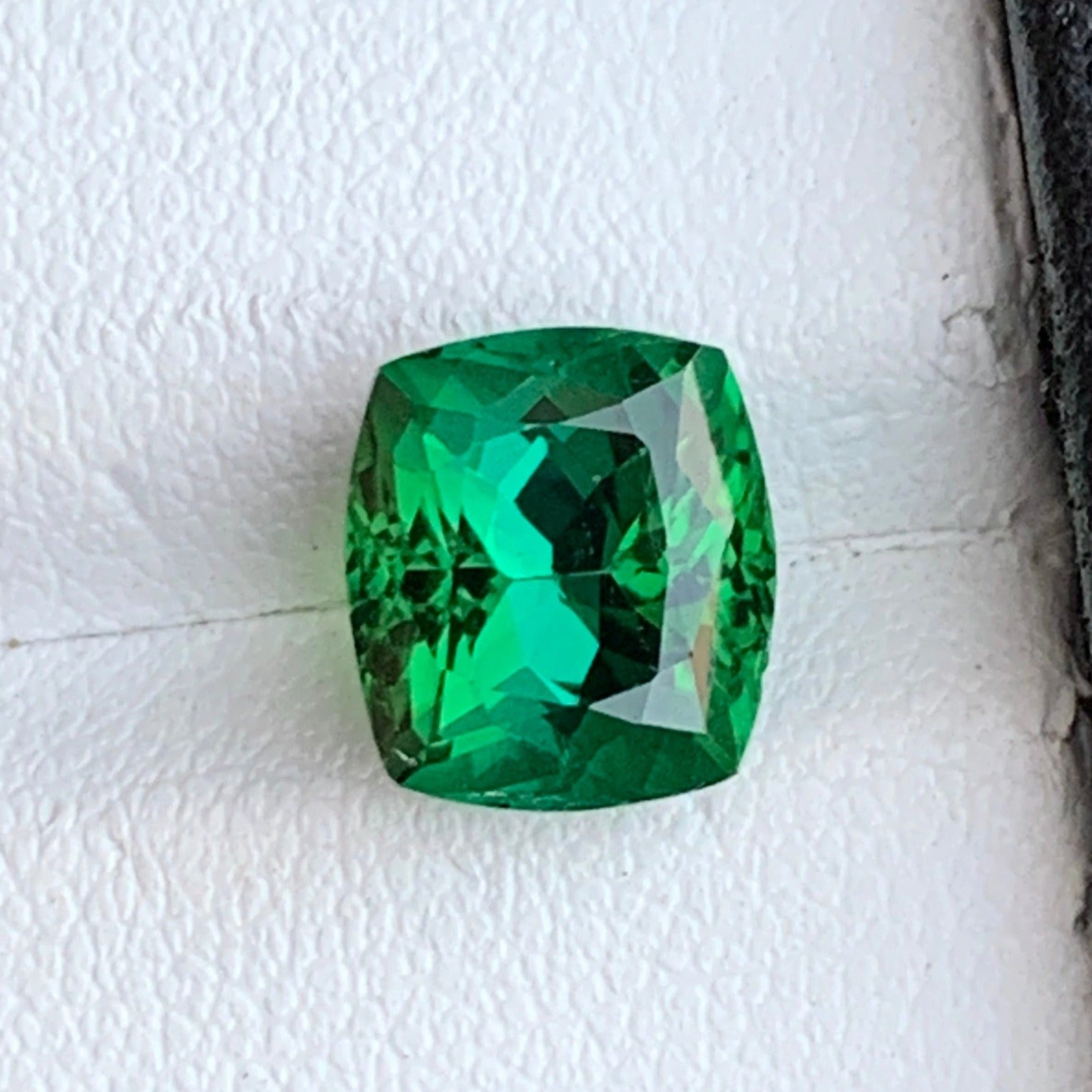 bright forest green tourmaline stone
