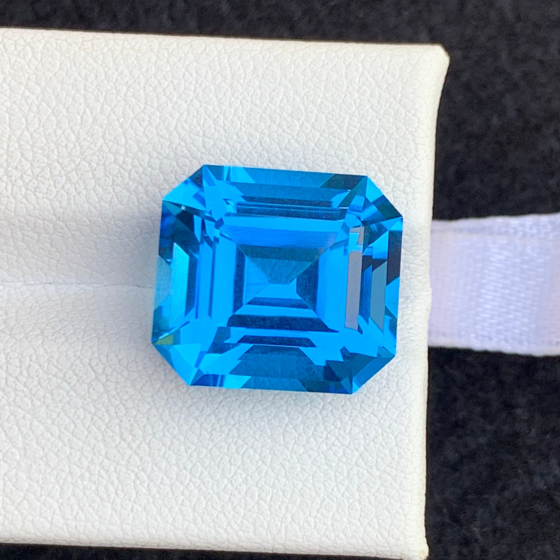 Electric Swiss Topaz ring
natural swiss blue topaz africa
emerald cut blue topaz gemstone close up