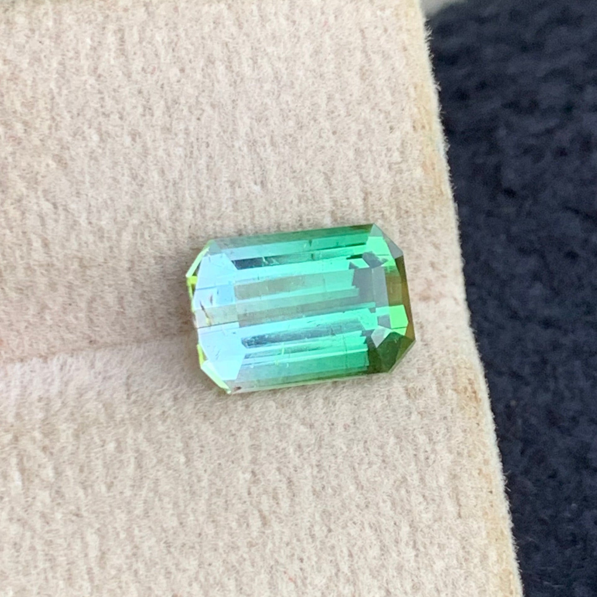 natural untreated bicolor tourmaline gemstone
unique emerald cut tourmaline dual color stone