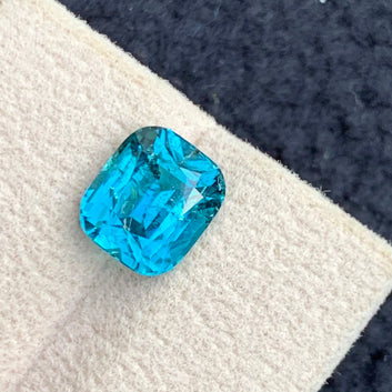 tourmaline jeweley
tourmaline ring
cushion cut neon blue tourmaline
faceted blue tourmaline gemstone