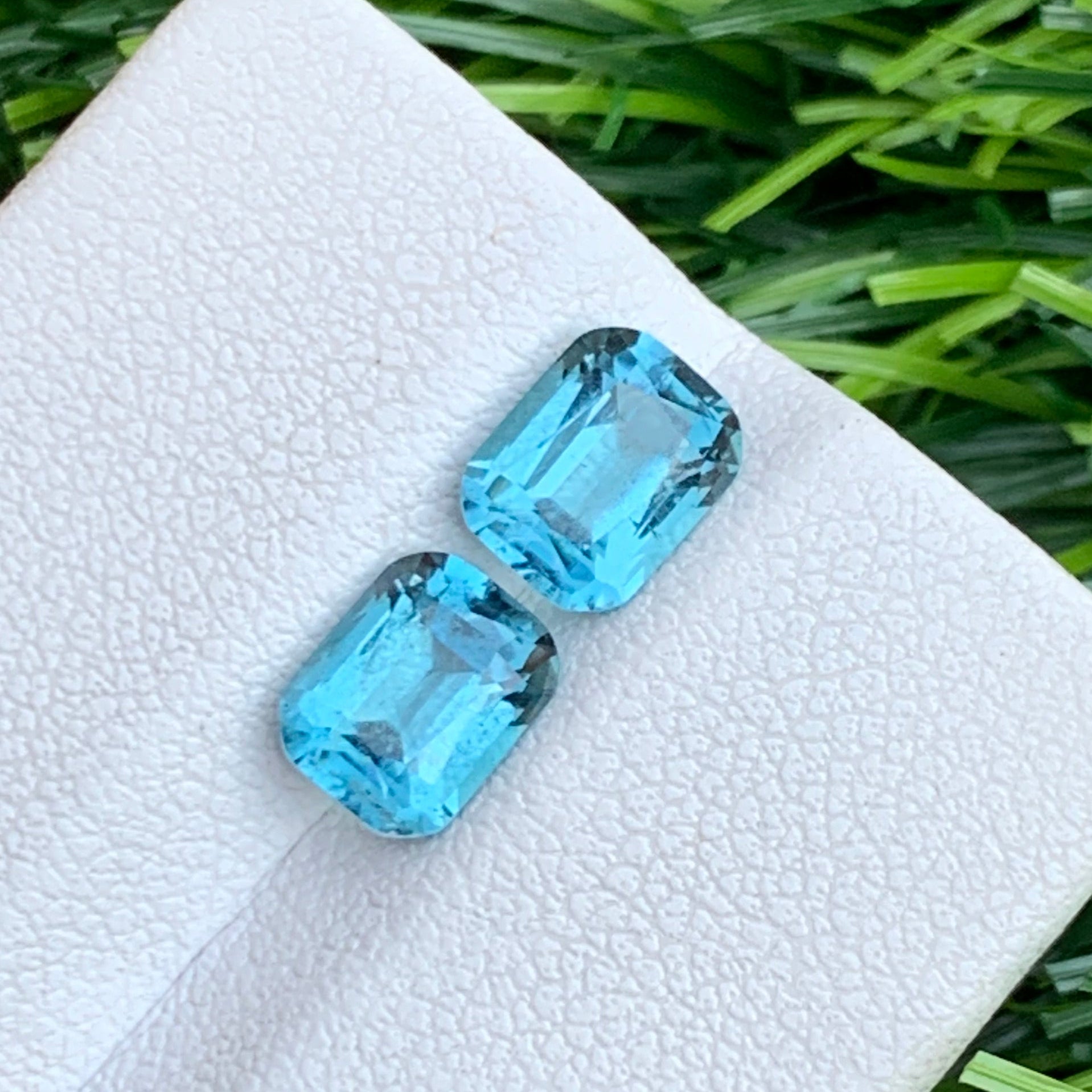 Neon Blue Stone Pair
neon blue tourmaline pair cushion cut

blue tourmaline gemstone pair