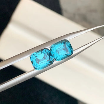 Explore the Vivid Beauty and Healing Properties of a 2.50 Carat Neon Blue Tourmaline Pair