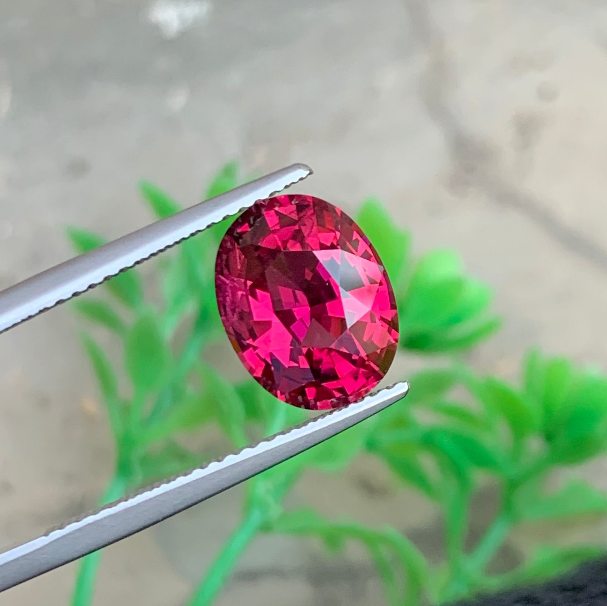 Umbalite garnet ring
Umbalite garnet pendant
oval cut umbalite garnet loose stone
rare pink red garnet gemstone close view