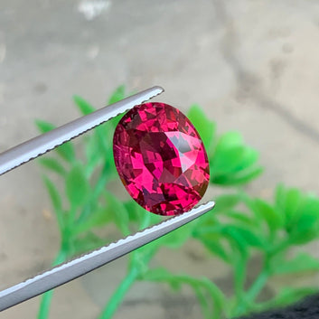 Umbalite garnet ring
Umbalite garnet pendant
oval cut umbalite garnet loose stone
rare pink red garnet gemstone close view