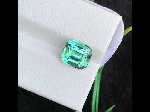 Cushion cut seafoam tourmaline gemstone close-up
Eye clean natural greenish tourmaline gemstone
Loose faceted Afghan tourmaline for jewelry making