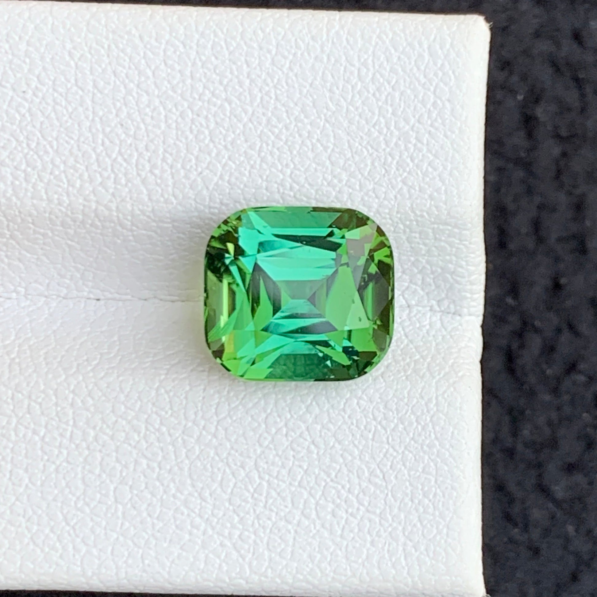 Bluish Green Ring
untreated green tourmaline gemstone

cushion cut verdelite tourmaline

loose bluish green tourmaline USA