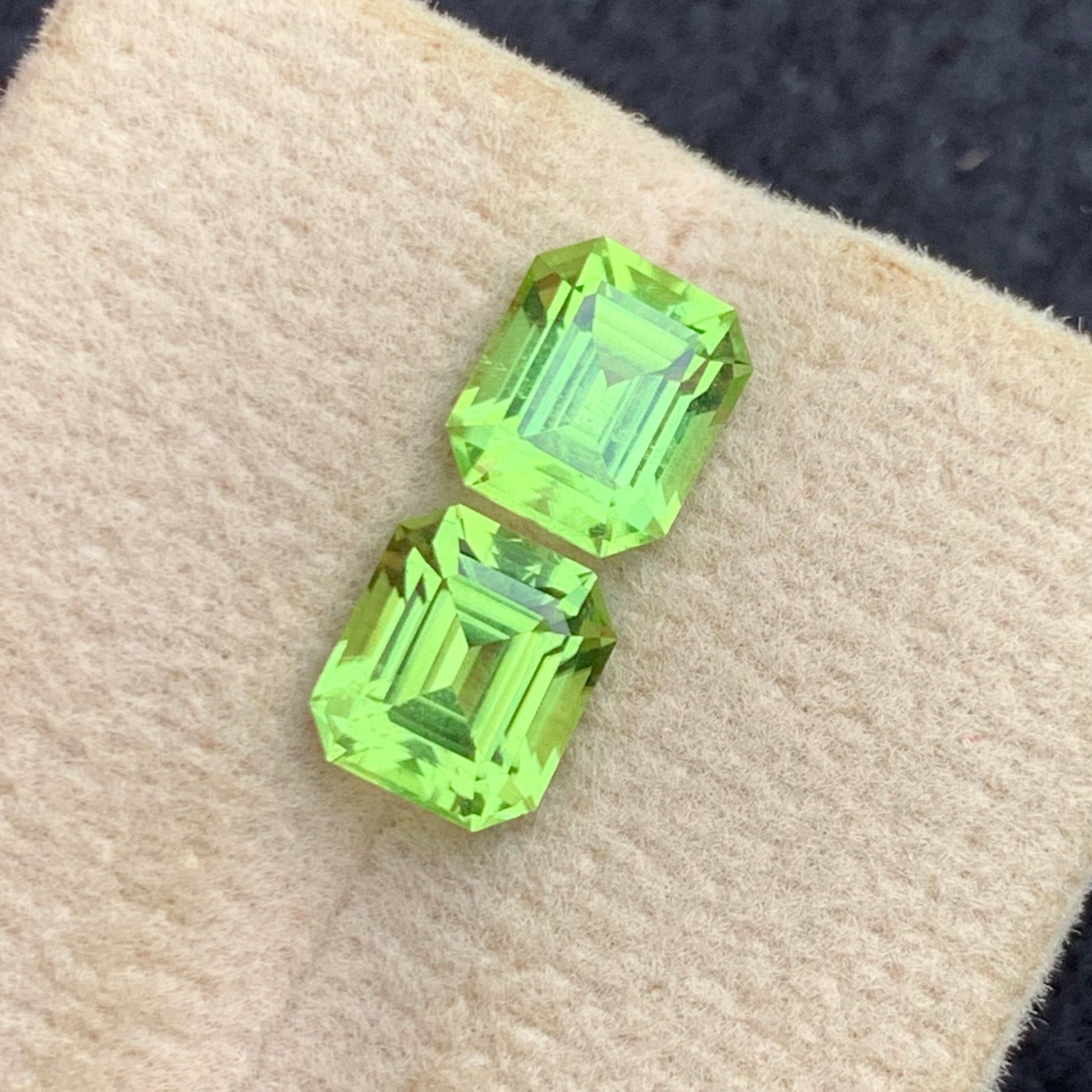 vibrant green peridot gemstone pair macro detail high clarity
matched peridot pair emerald cut luxury jewelry stones